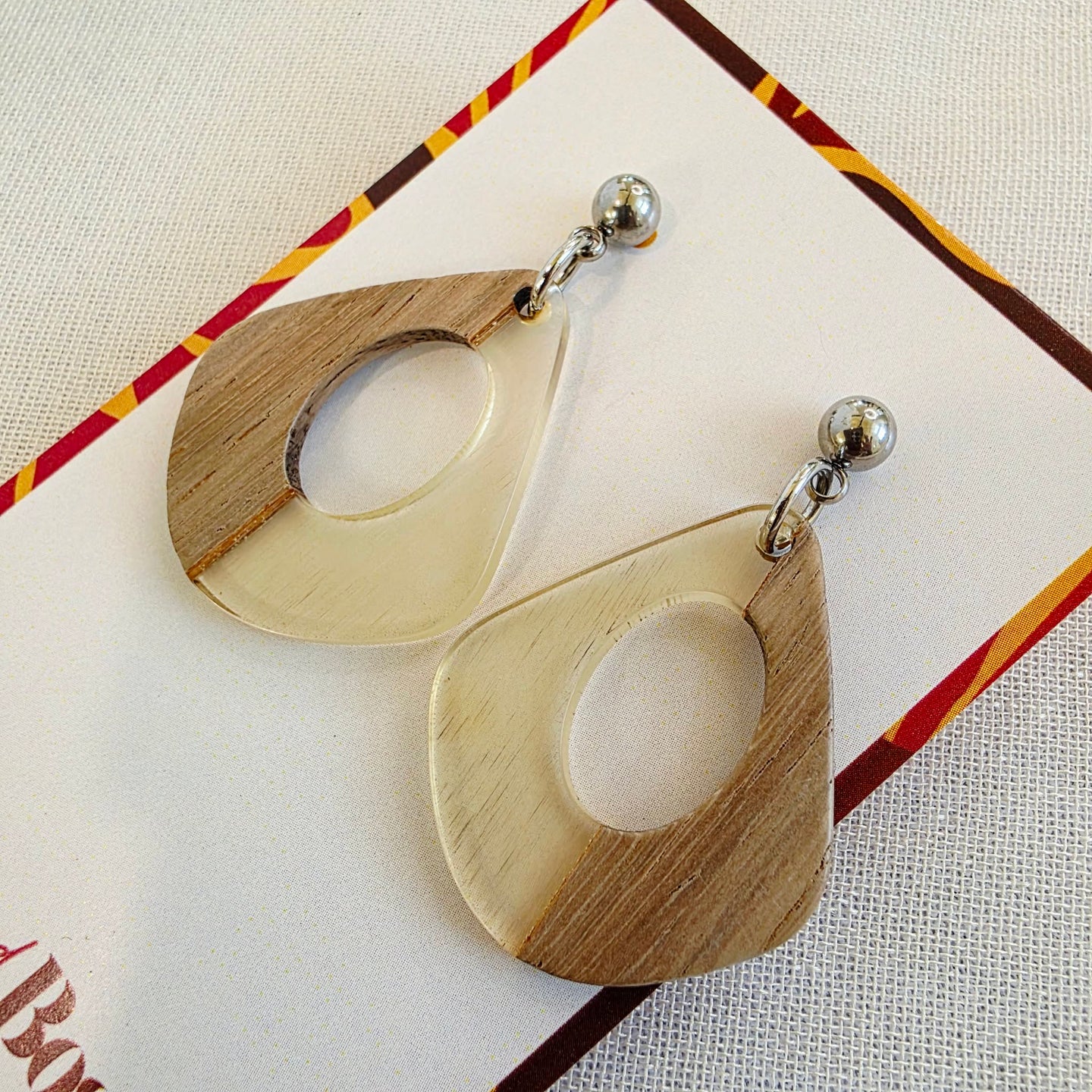 Clear Open Teardrop Dangles Dr. Amy