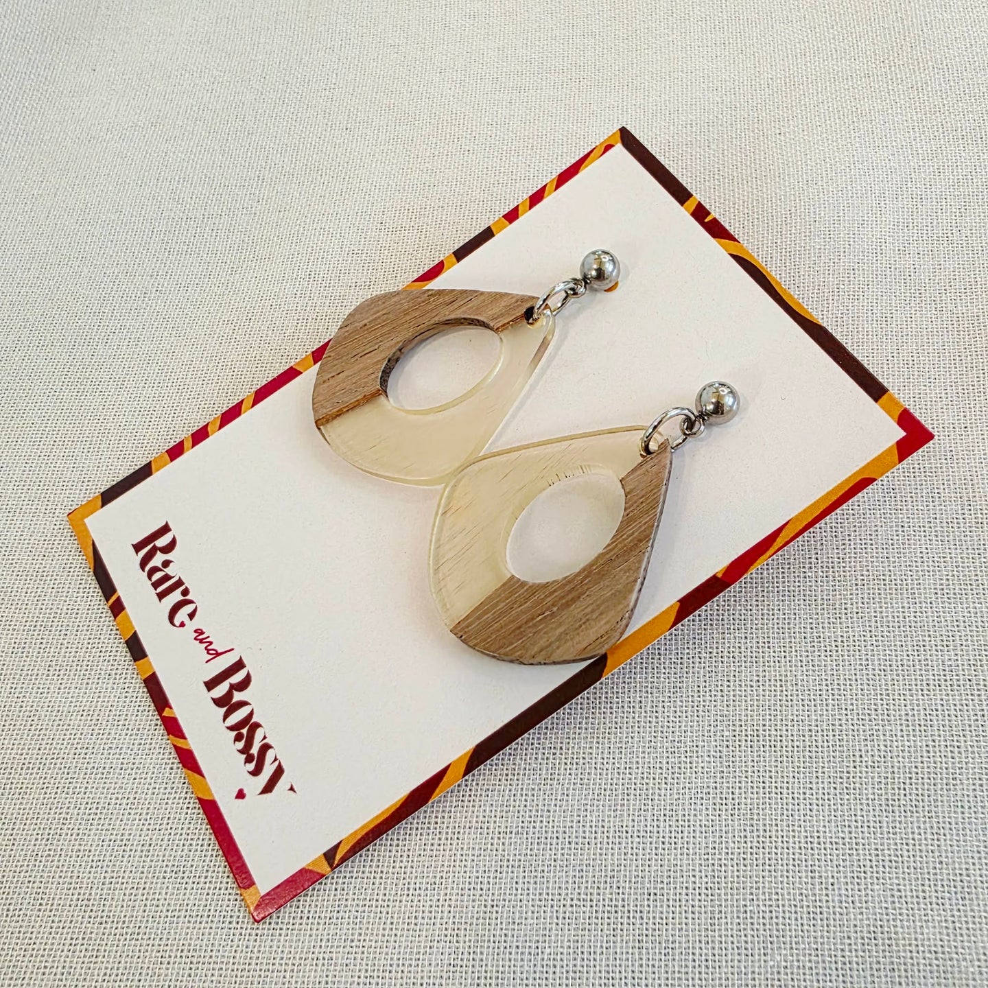 Clear Open Teardrop Dangles Dr. Amy