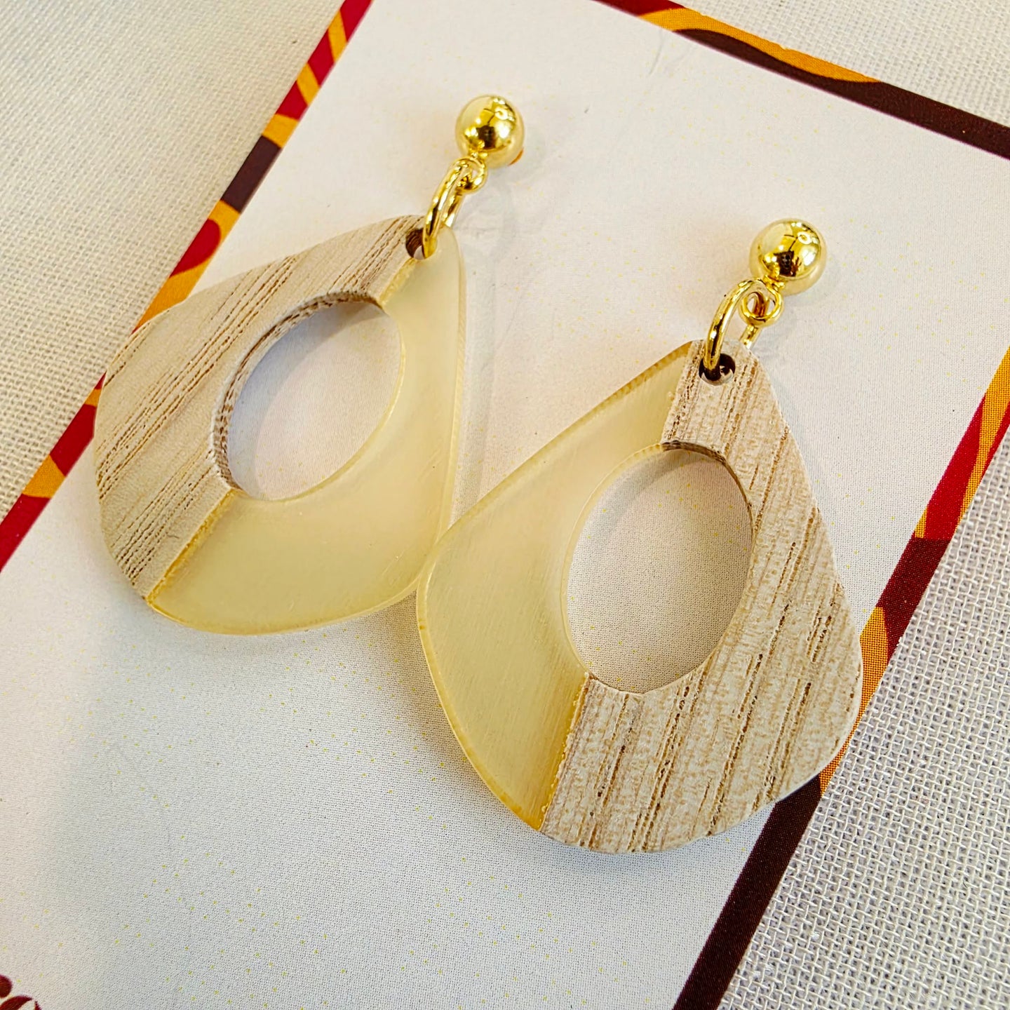 Clear Open Teardrop Dangles Dr. Amy